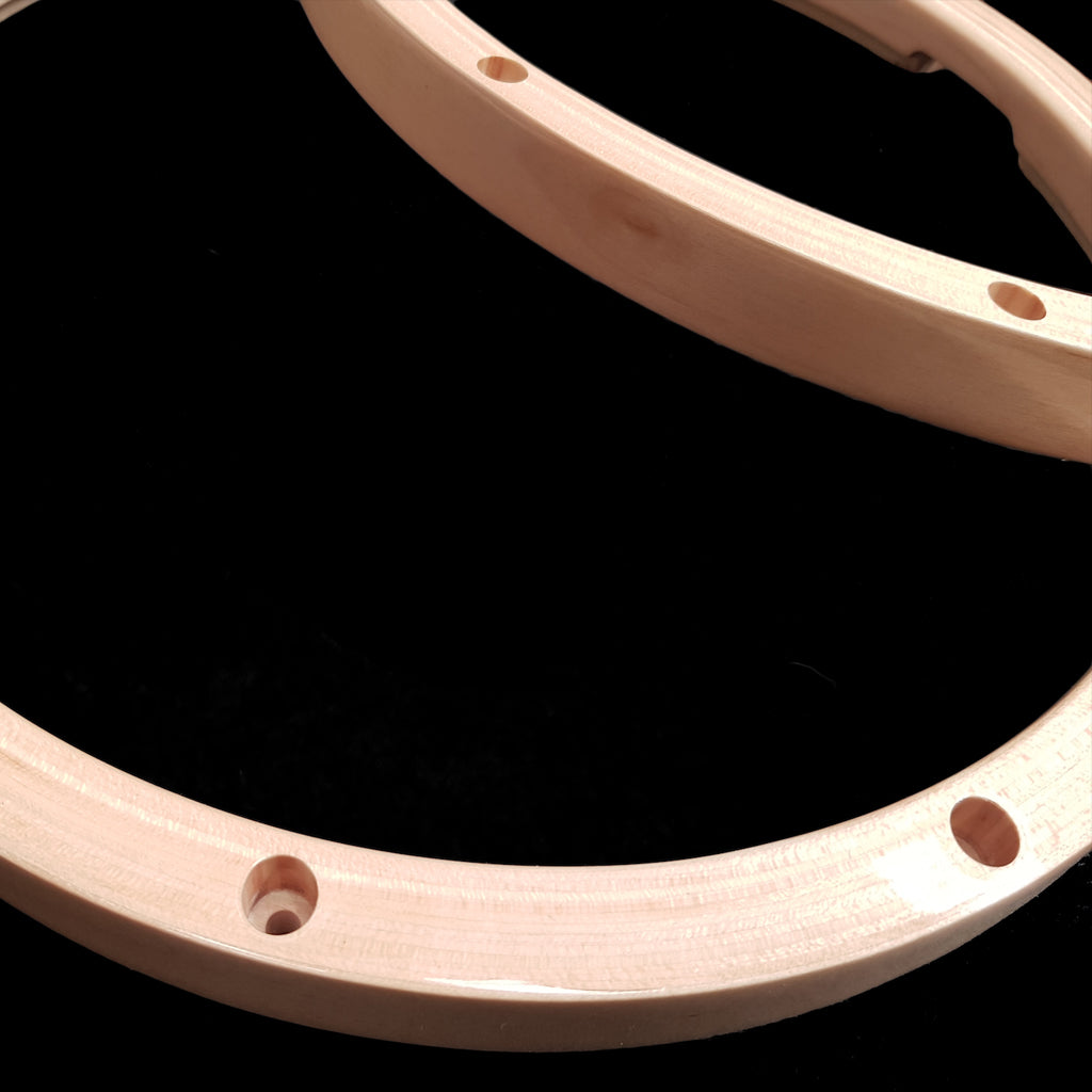 Close Up of a Pair of DFP Lacquered Maple Snare Drum Hoops