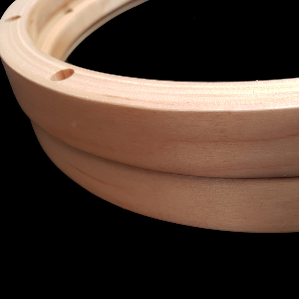 Close Up of a Pair of DFP Lacquered Maple Snare Drum Hoops