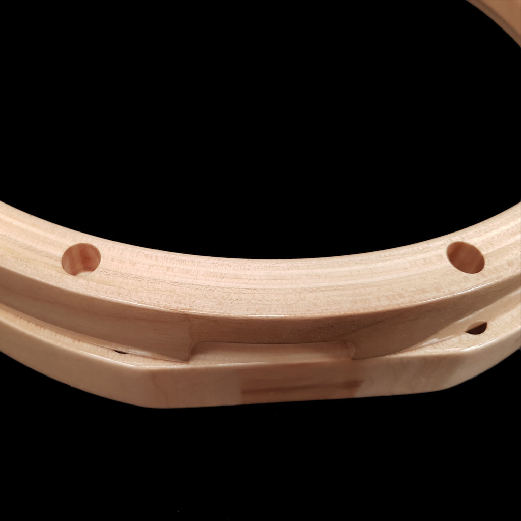 Shaped Edges of a set of DFP Lacquered Maple Drum Hoops for Snare